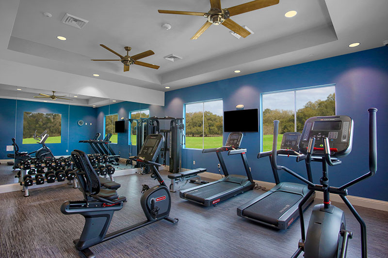 The fitness room at The Landing in On Top of the World Communities Active Adults