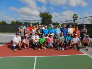 Group photo of Top Pickleball Club members at On Top of the World Communities
