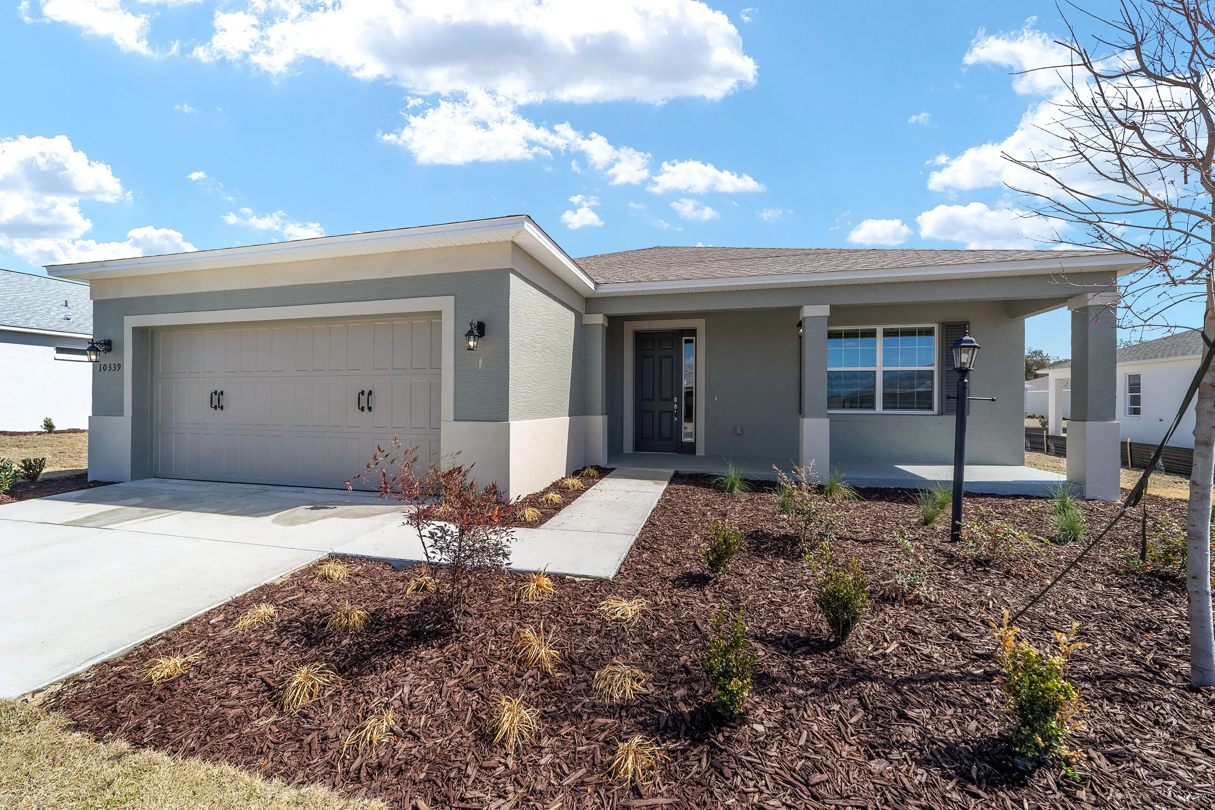 MIR_10339-SW-105th-Terrace_Lot144_front-exterior brand new, spacious modern 3 bedroom house for sale in Ocala FL modern facade